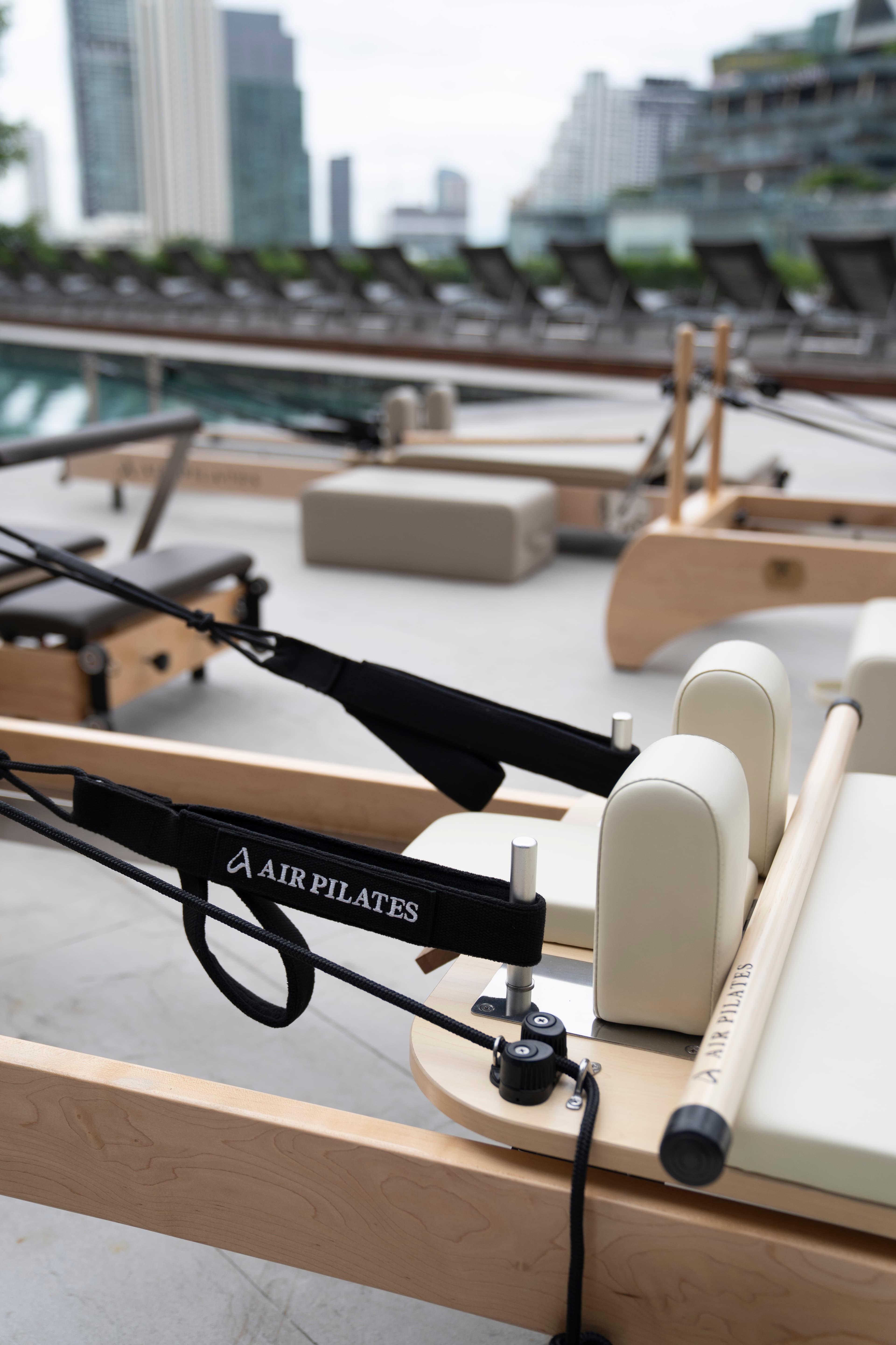 Reformer equipment set up against the Bangkok skyline
